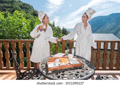 Women At A Rural House Having Breakfast Together. Homosexual Couple Enjoying A Weekend Rural Getaway. Travel In Spain And Europe With Partner