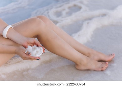 women with salts in the Dead Sea