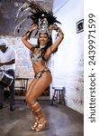 Women, samba and portrait with show at carnival, band and dancer with smile, culture or creativity in nightclub. Girl, people and dancing to music, stage or fashion for celebration in Rio de Janeiro