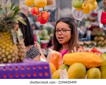 Women Shopping In A Local Market In El Salvador. Hispanic Women.