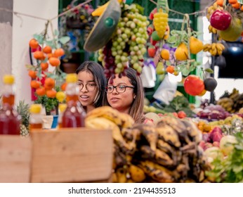 Women Shopping In A Local Market In El Salvador. Hispanic Women.