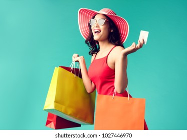 Women are shopping In the summer she is using a credit card and enjoys shopping.