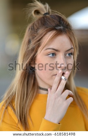 Similar – Image, Stock Photo Pretty blond girl with long hair smoking