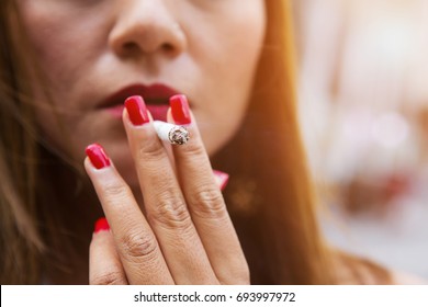 Women Smoking Outdoor , Close-up With Copy Space