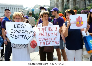 Women Standing With Posters Saying Stop Contemporary Slavery. Street Action Protest Against Human Trafficking In The World. June 12, 2019. Kiev, Ukraine