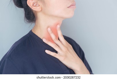 Women Suffering From Acid Reflux. A Burning Sensation In The Throat There Is Sputum Inside. Chest Tightness. Health Care Concept.