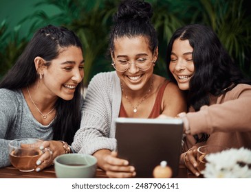 Women, tablet and friends in cafe together for social media post, food app and reunion with bonding. Gen z people, tech and girl siblings in coffee shop for online menu, reading gossip story and love - Powered by Shutterstock