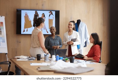 Women taking over the industry. Shot of a group of female designers working in an office. - Powered by Shutterstock