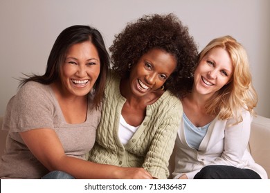 Women talking and laughing.