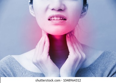 Women With Thyroid Gland Problem On The Blue Background