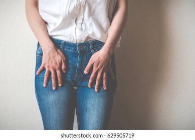 Women Touching Lower Abdomen