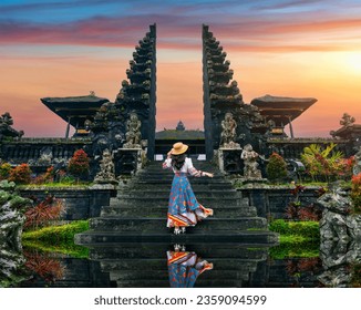 Women tourists standing at Besakih temple in Bali, Indonesia.