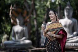  Women In Traditional Clothing  On Buddhist On Background.  Portrait Women In Traditional Clothing , Thai Traditional  In Ayutthaya, Thailand.