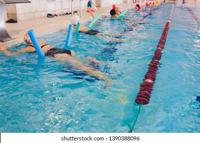 Women Trains In Aqua Aerobics, Learn To Swim.