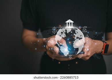 Women use mobile phones and laptop computers for money transfers and currency exchanges between countries of the world. online banking interbank payment concept. - Powered by Shutterstock