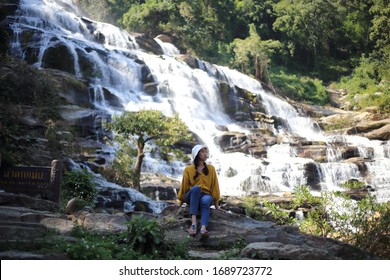 Women the view in Mae Ya waterfall at Doi Inthanon national park, Chiang Mai, Thailand