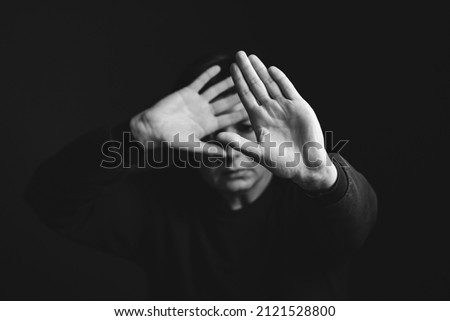 Similar – depressed man closes his eyes with his hands