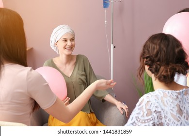Women visiting her friend after chemotherapy at home