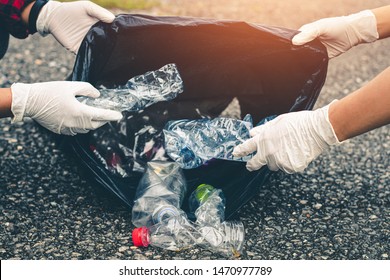 Women volunteer help garbage collection for to recycling environment. - Shutterstock ID 1470977789
