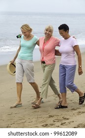 Women Walking Beach Together