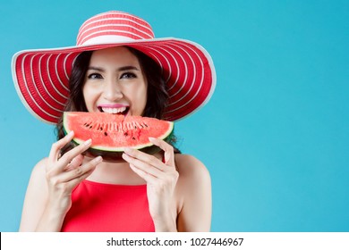 Women Wear Dresses. She Is Eating Watermelon. In The Summer She Feels Refreshed