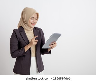 women wearing suits hijab happy working with the tablet formal work concept isolated white background - Powered by Shutterstock