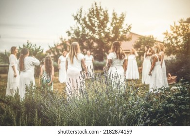 Women In White Dresses Dancing In Nature. Ceremonial Dance.
