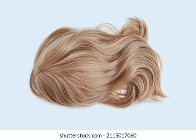 Women wig with bangs blond. White background.