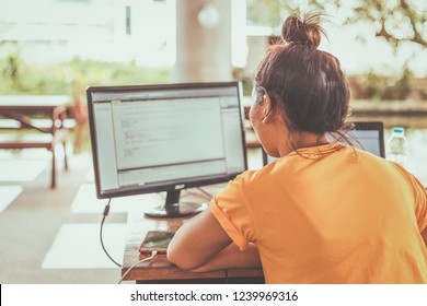 Women Working With Computer For Design And Coding Program.