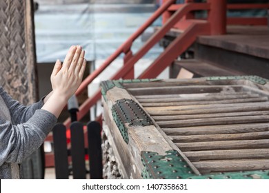 Women Worshiping At A Japanese Shrine