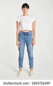 Women's White Crop Top Mockup And Jeans