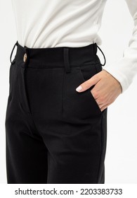Women's Black Trousers. Woman In Pants And White Turtleneck. Clothes For Work, College Or School. Office Dress Code. Comfortable Pocket