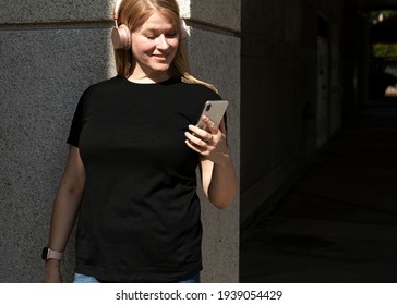 Women's black t-shirt) streetwear size inclusive city apparel shoot - Powered by Shutterstock