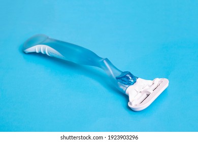 Womens Blue Razor On A Blue Background Close Up