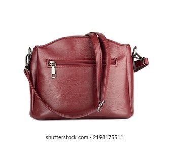 Women's Burgundy Leather Handbag With A Long Strap On A White Background.