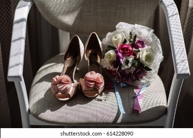 Women's Casual And Luxurious Shoes. Women's Shoes On The Bed. So Many Different Shoes.