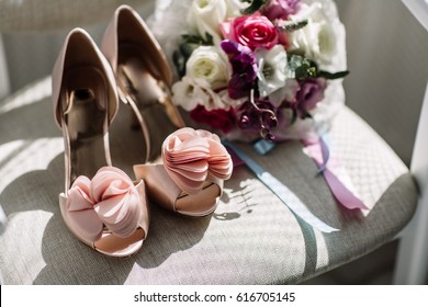 Women's Casual And Luxurious Shoes. Women's Shoes On The Bed. So Many Different Shoes.