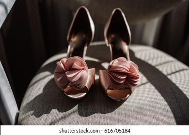 Women's Casual And Luxurious Shoes. Women's Shoes On The Bed. So Many Different Shoes.