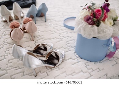 Women's Casual And Luxurious Shoes. Women's Shoes On The Bed. So Many Different Shoes.