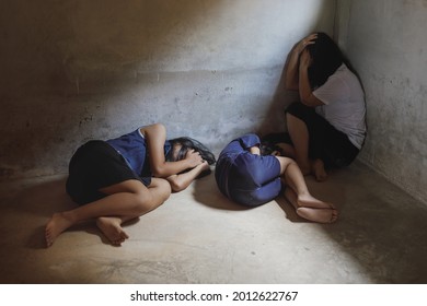 Womens and children of victim in the room, Human trafficking - Shutterstock ID 2012622767