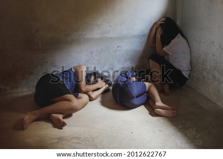 Womens and children of victim in the room, Human trafficking