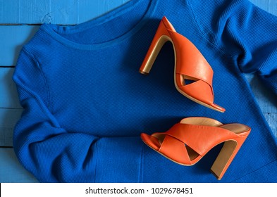 Womens Clothing, Footwear (blue Blouse,  Leather Terracotta Shoes). Fashion Outfit. Shopping Concept. View From Above.  Trendy, Saturated Colors 
