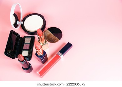 Women's Cosmetics On A Pink Background. Women's Beauty Tricks.