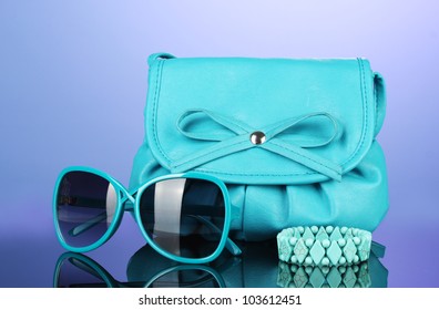 Women's fashion accessories on bright colorful background