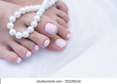 Women's Feet With Amazing Pedicure. Nails With Gel Polish Applied.