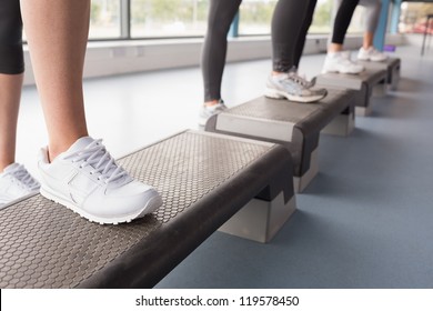 Womens Feet Stepping In Aerobics Class In Gym