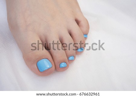 Women's foot and clean pedicure, natural nails. Gel polish applied.