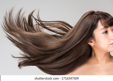 Women's hair is vibrant and shining.