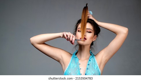 Women's Haircut And Hairdresser. Bangs Hair. Close Up Hairstyle With Bangs. Hair Cut. Close-up Of A Hairdresser Cutting The Hair. Hairdresser Cutting Hair In Salon Closeup.