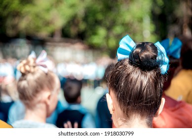 Womens Hairstyle, Back View, A Bun Of Hair Decorated With A Bow, 50s Style 